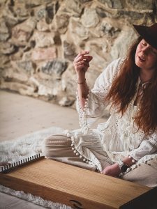 mrs peony wellbeing playing monochord